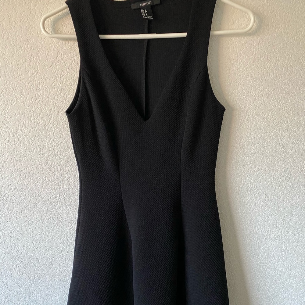 Very cute little black dress with flare